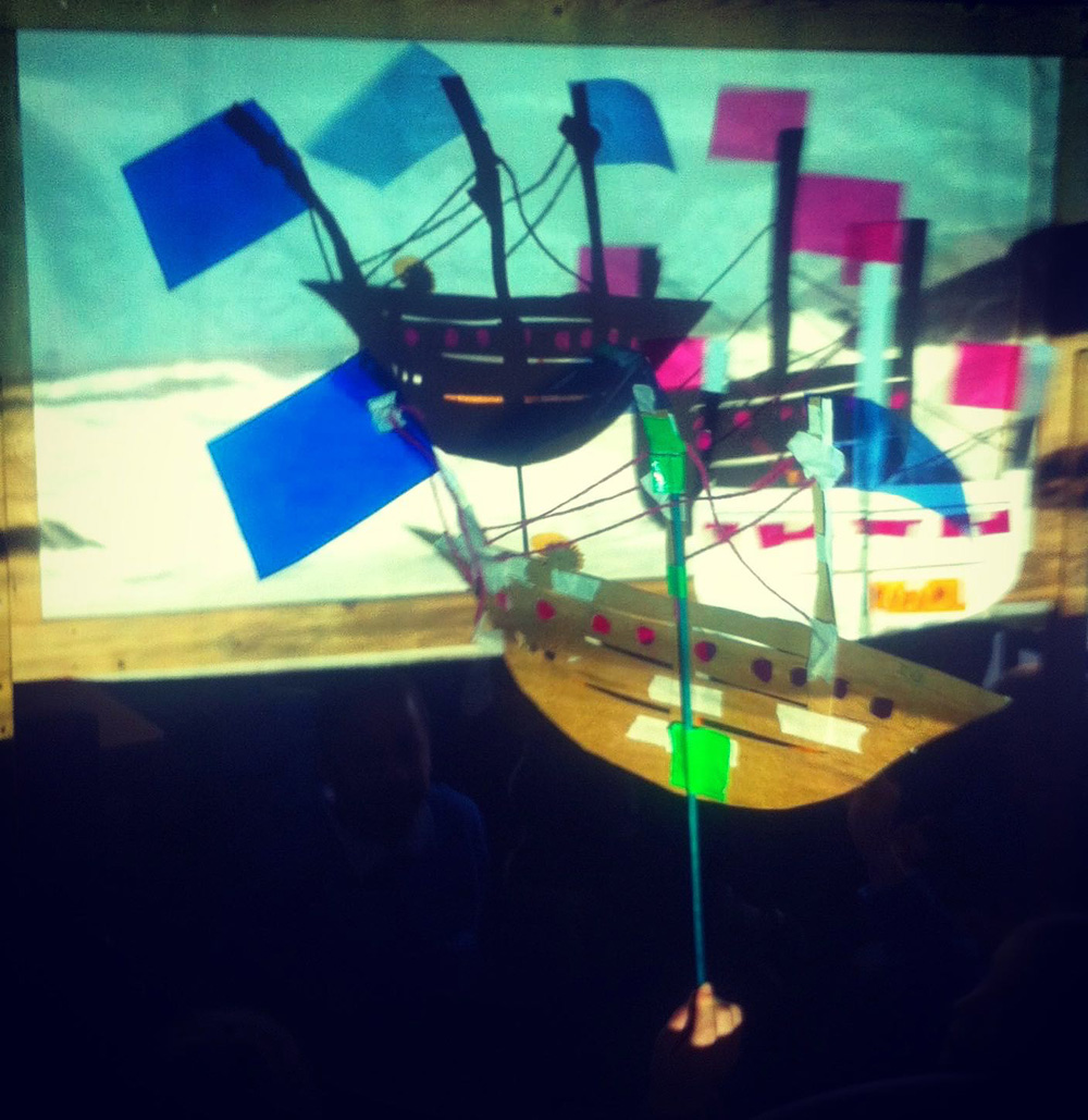 Tudor ship shadow puppets on stormy sea at Glenfrome Primary School, Bristol